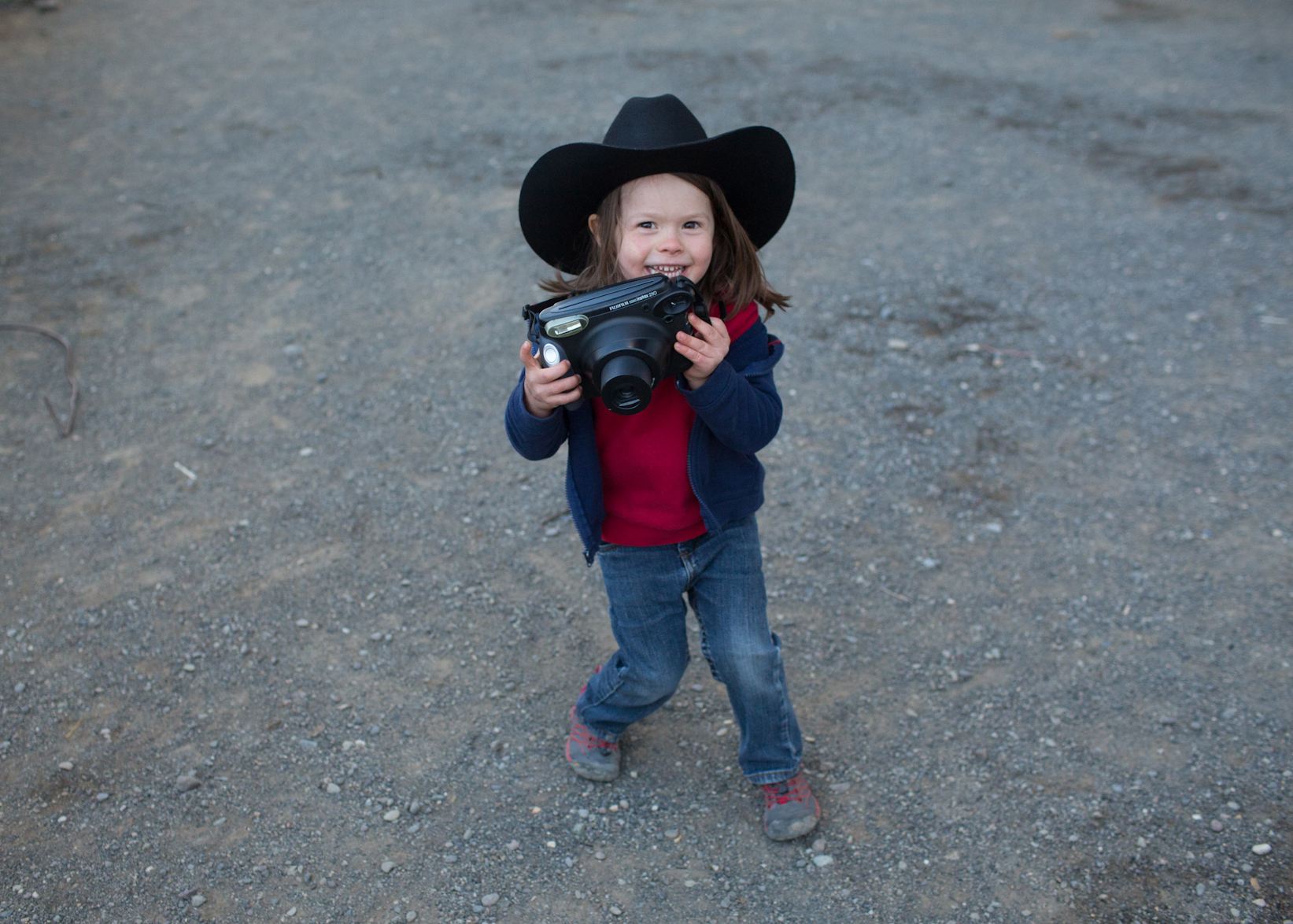 caption: Hawkeye Huey with his FujiFilm camera.