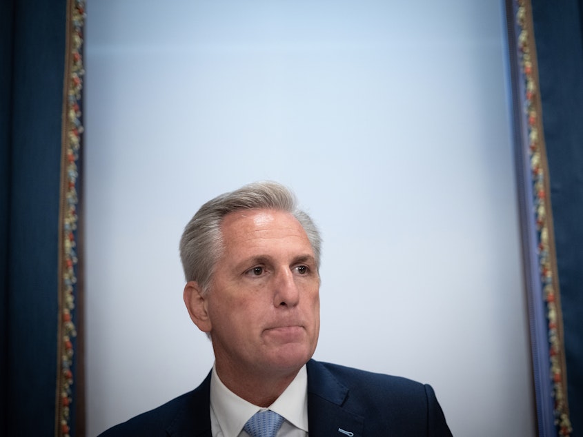 caption: House Minority Leader Kevin McCarthy, seen here on Capitol Hill on May 19, issued a statement Tuesday morning condemning comments made by Rep. Marjorie Taylor Greene that compared the events of the Holocaust to mask-wearing mandates.
