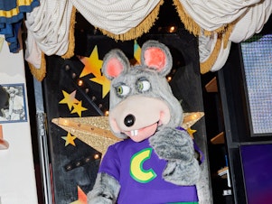 caption: Chuck E. Cheese, the frontman for the animatronic Munch's Make Believe Band at the Chuck E. Cheese location in Northridge, Calif. This animatronic band is the last remaining one in the United States as locations remodel in favor of screens and interactive dance floors.