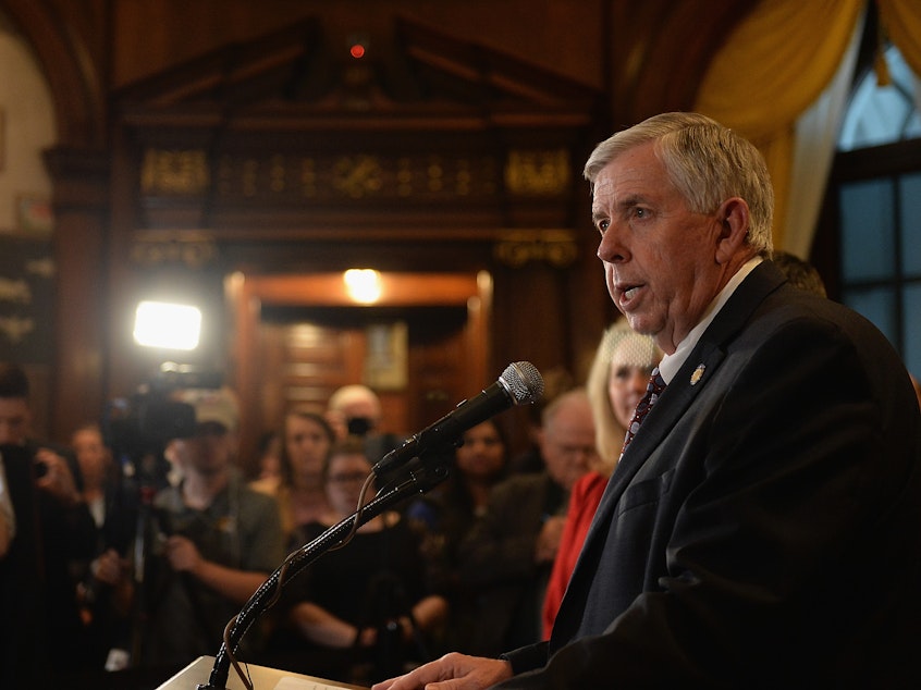 caption: Missouri Gov. Mike Parson signed into law on Friday a ban on nearly all abortions after eight weeks of pregnancy.