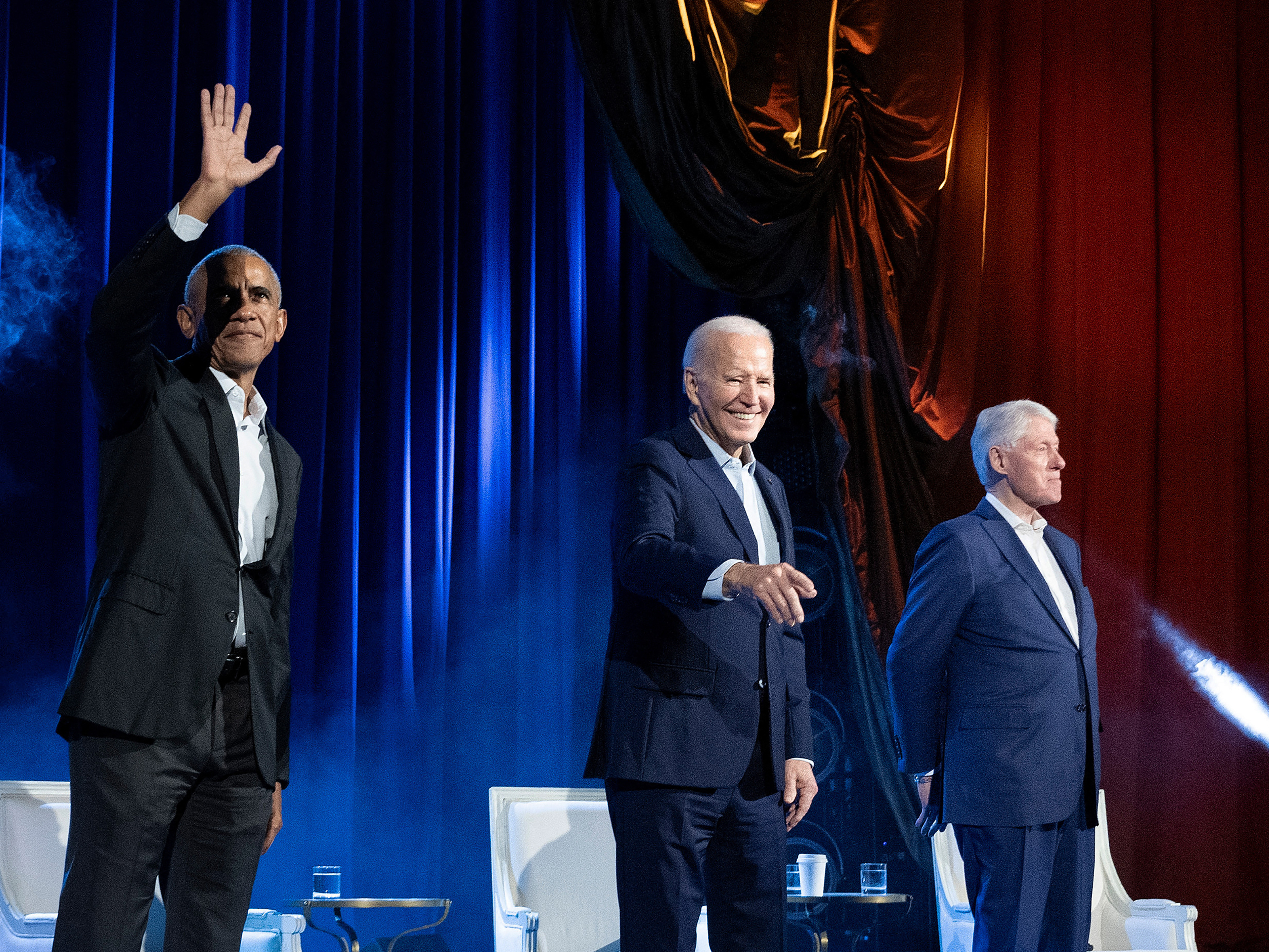caption: Barack Obama, Joe Biden and Bill Clinton attend a campaign fundraising event in New York on March 28.