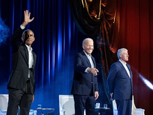 caption: Barack Obama, Joe Biden and Bill Clinton attend a campaign fundraising event in New York on March 28.