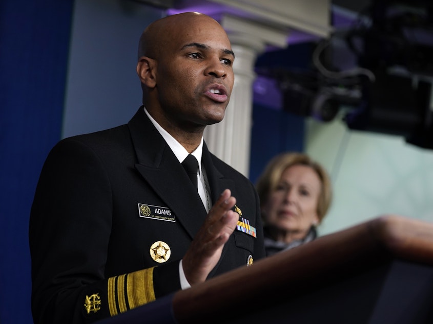 caption: "We really need to come together as a nation" to fight the COVID-19 respiratory disease,<strong> </strong>Surgeon General Jerome Adams said on Monday. America's top doctor warned that "this week it's going to get bad."