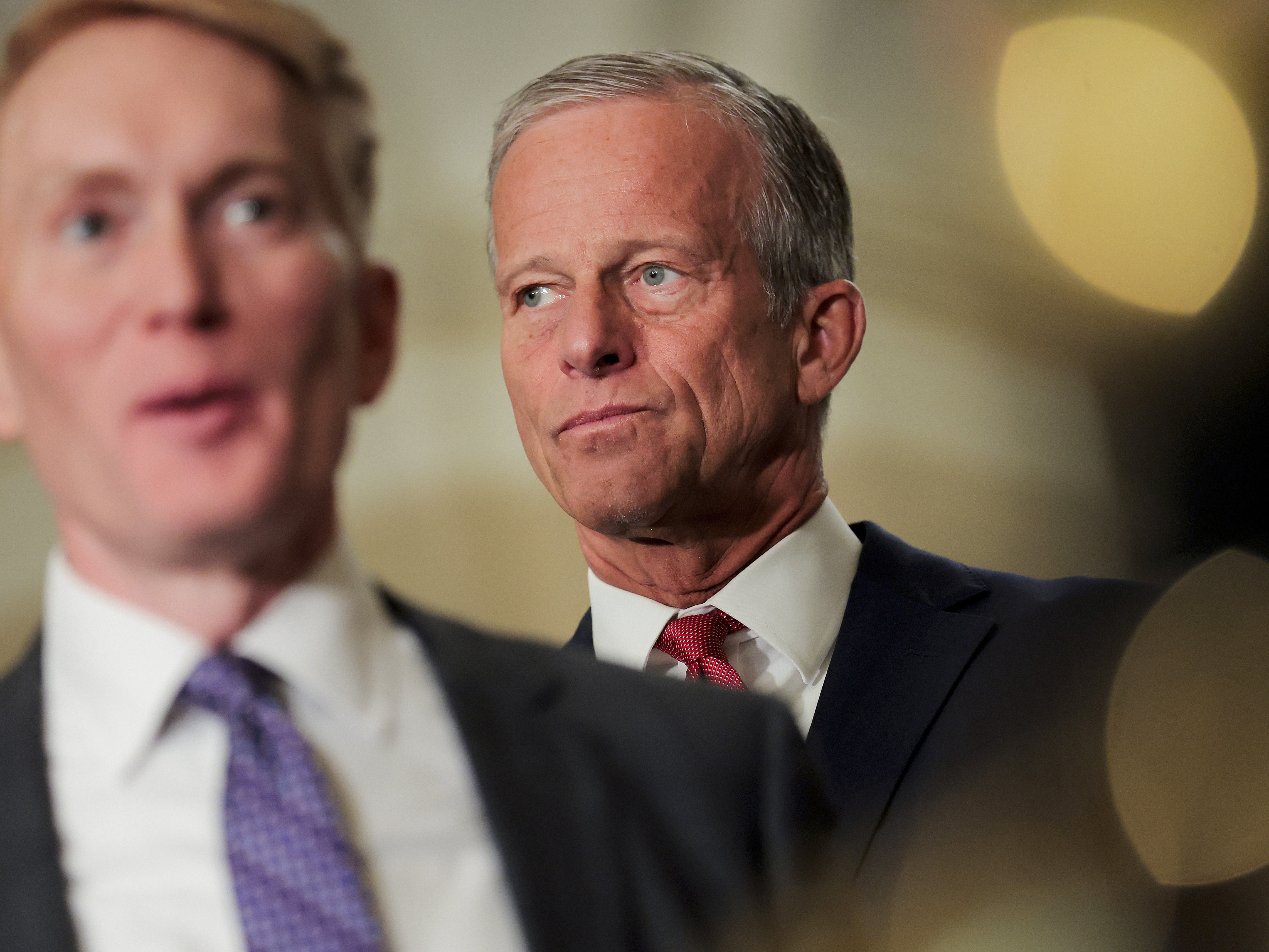 caption: Sen. James Lankford (R-Okla.) speaks with the press while U.S. Senate Majority Leader John Thune (R-S.D.) looks on following weekly policy luncheons at the U.S. Capitol on April 21, 2026.