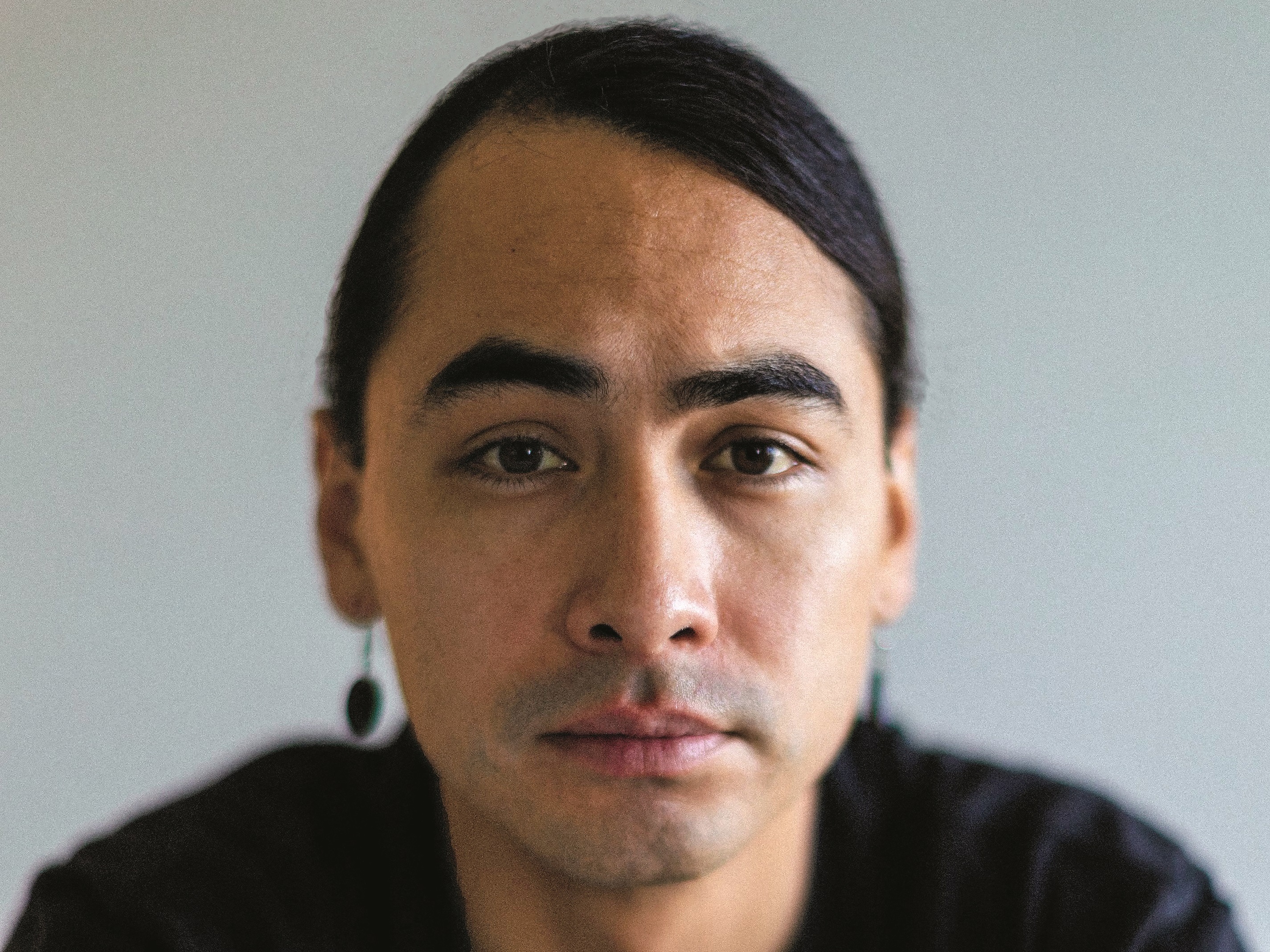 caption: Julian Brave NoiseCat is the author of <em>We Survived the Night.</em>