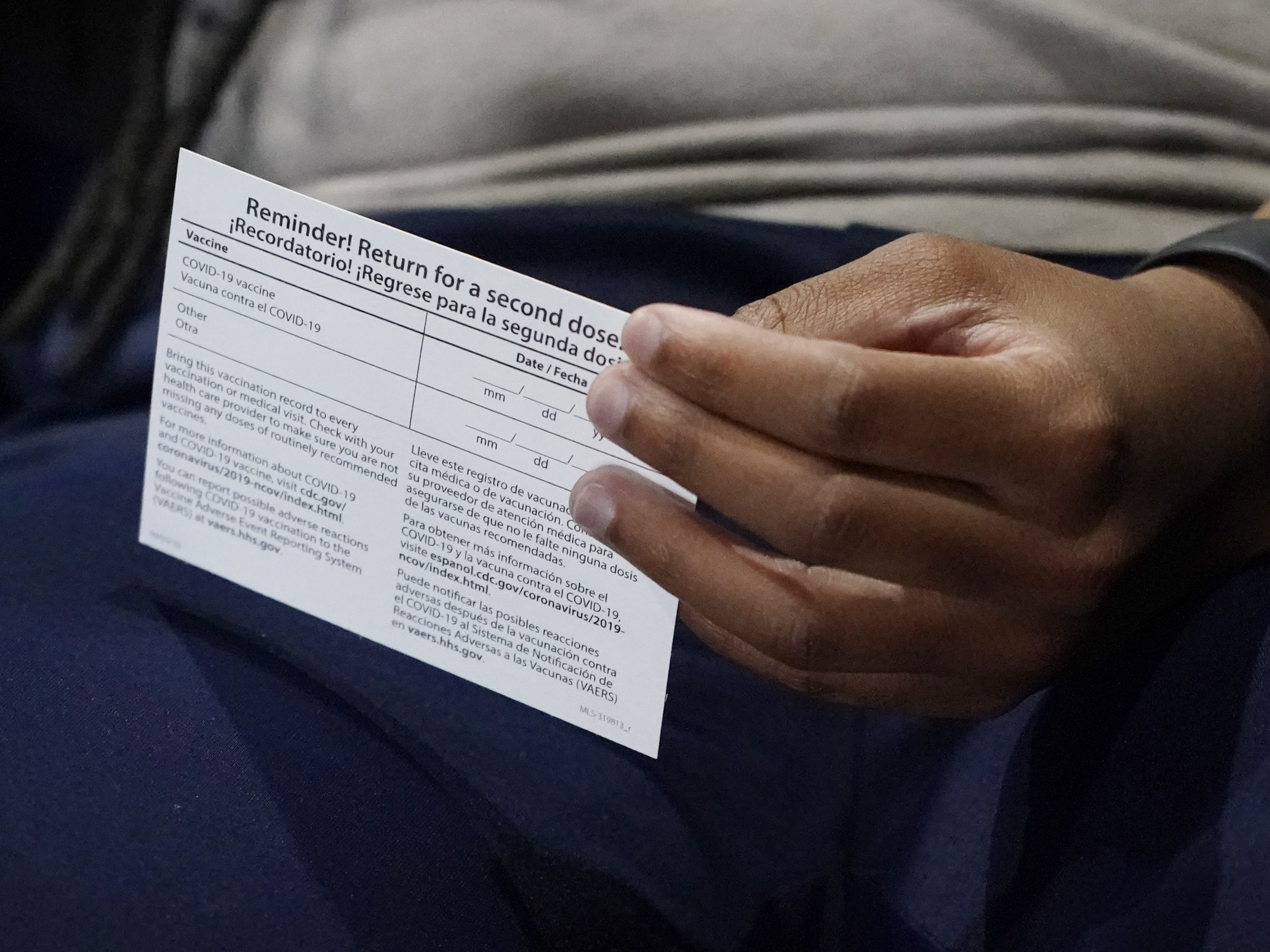 caption: Vaccination cards are key to a lot of activities, so they need to be both protected and available.