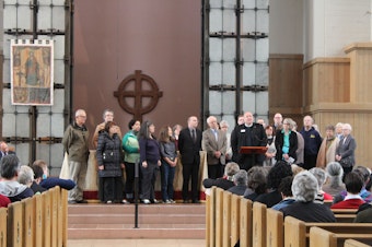 caption: Faith communities gather on May Day 2017 at St. Mark's Cathedral in Seattle's Capitol Hill neighborhood to declare their support for immigrants and refugees.