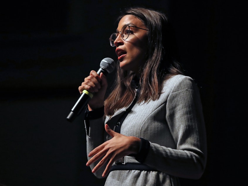 caption: Rep. Alexandria Ocasio-Cortez, D-N.Y., speaks during a rally for Democratic presidential candidate Sen. Bernie Sanders, I-Vt., in Iowa last month. She has announced a new PAC to back progressive congressional candidates.
