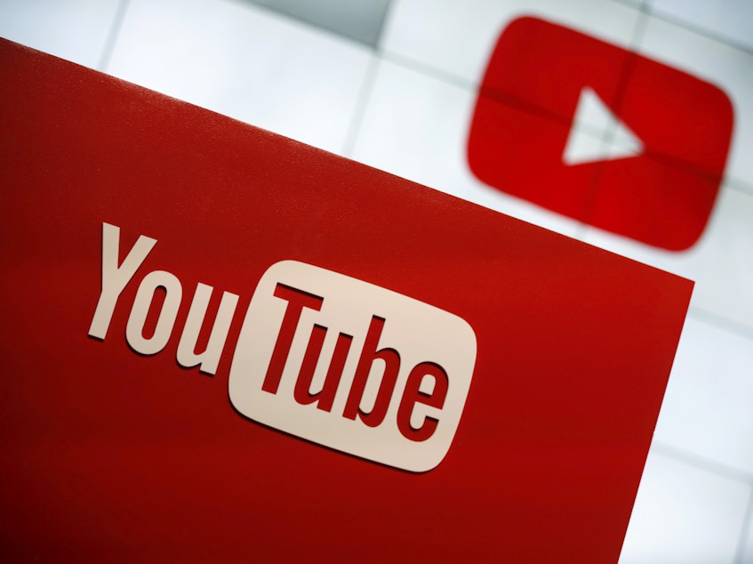 caption: YouTube says it will ban comments on videos featuring young minors, including cases where the videos are deemed to be "at risk" of attracting pedophiles' attention.