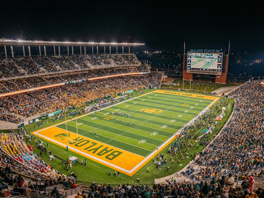 caption: The Baylor Bears take on West Virginia Mountaineers at McLane Stadium on Oct. 31, 2019 in Waco, Texas. In a new report, the NCAA says the culture of sexual violence and a lack of accountability spanned the entire Baylor University campus — both inside athletics and out.
