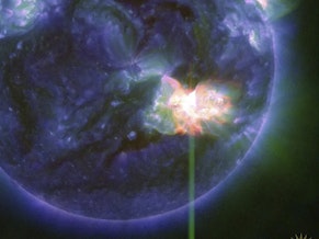 caption: The solar flare as captured by NASA's Solar Dynamics Observatory on Thursday. The flare has triggered a severe geomagnetic storm watch for the first time in nearly 20 years.