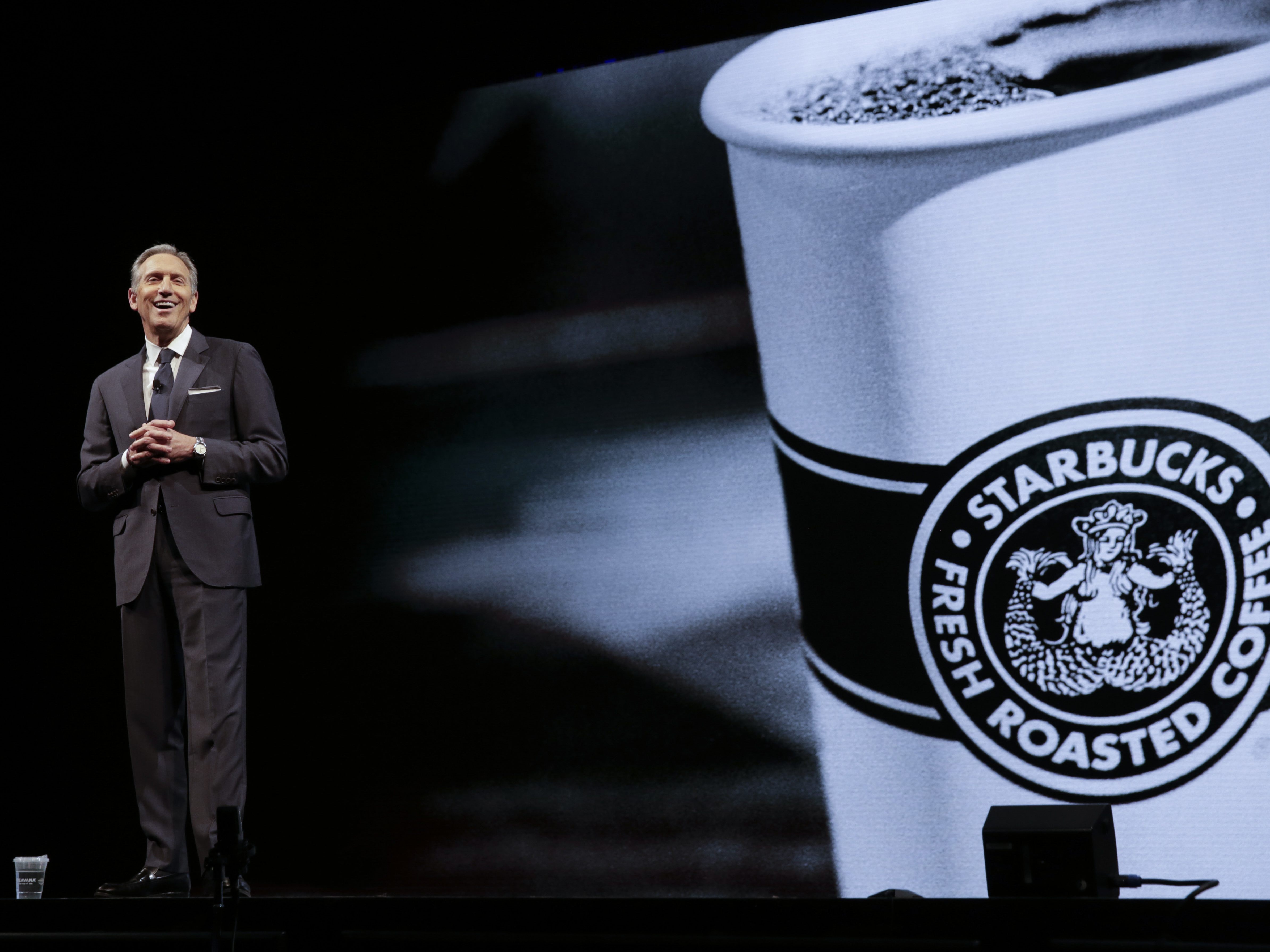 caption: Starbucks Executive Chairman Howard Schultz speaks at the Starbucks Annual Meeting of Shareholders in Seattle, Washington on March 21, 2018. Schultz returned to Starbucks as interim CEO on April 4, 2022.