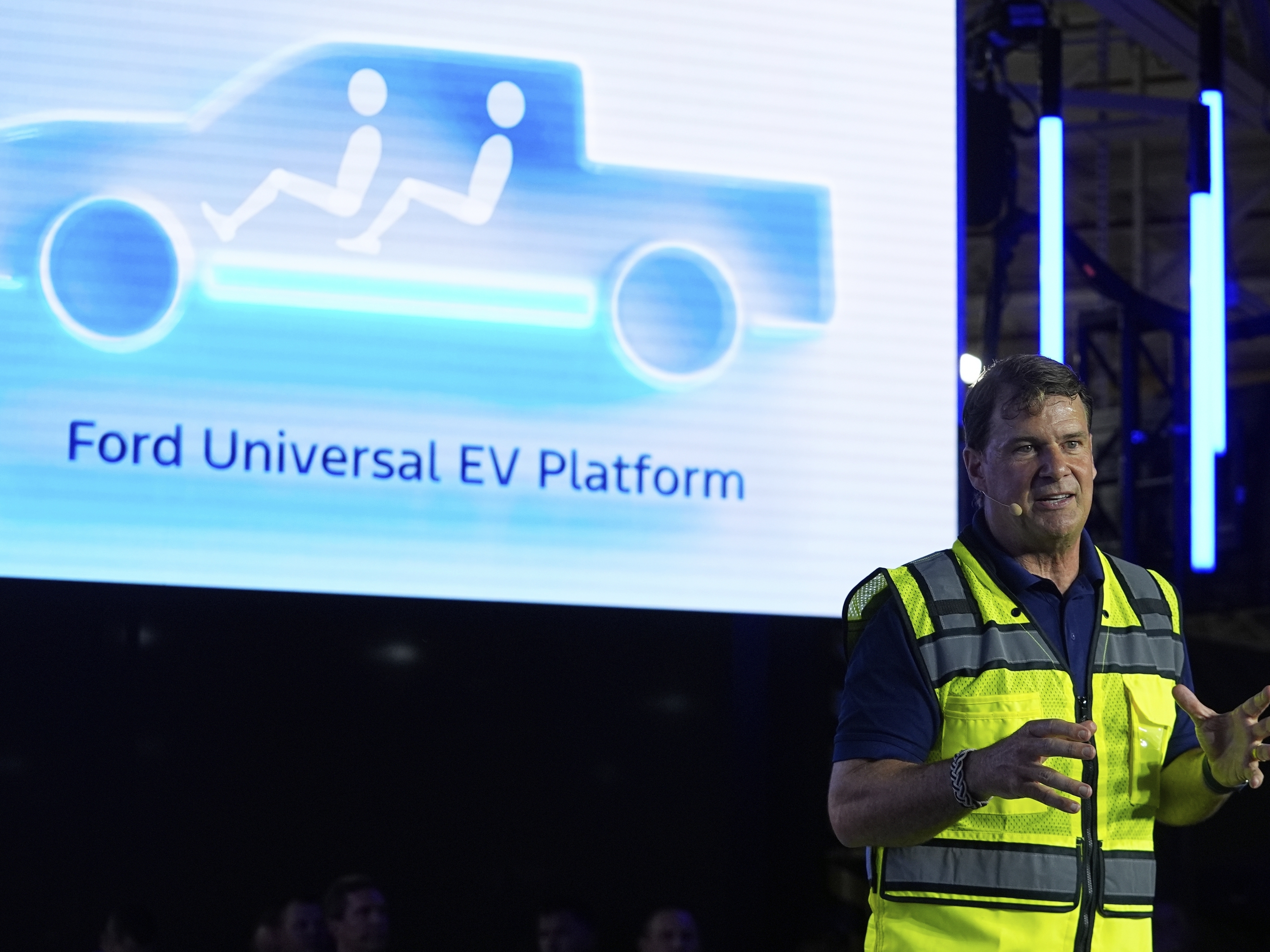 caption: Ford CEO Jim Farley speaks at the Louisville Assembly Plant, in Louisville, Ky., on Aug. 11.