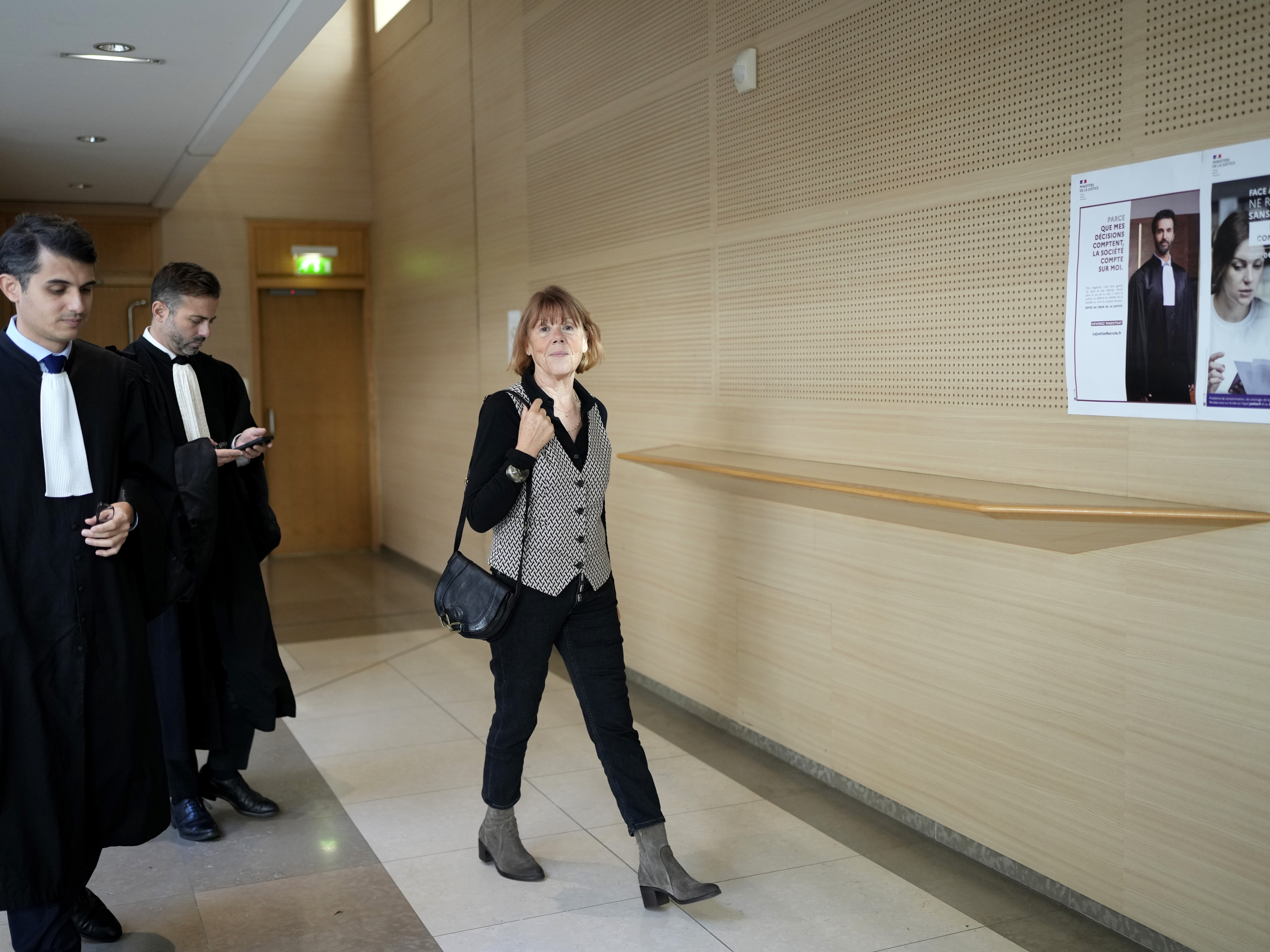 caption: Gisele Pelicot, who was allegedly drugged by her now former husband so that he and others could assault her, arrived at a courthouse, in Avignon, southern France, Oct. 16.