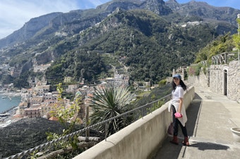 caption: The writer in Amalfi, Italy, where her grandfather is from.