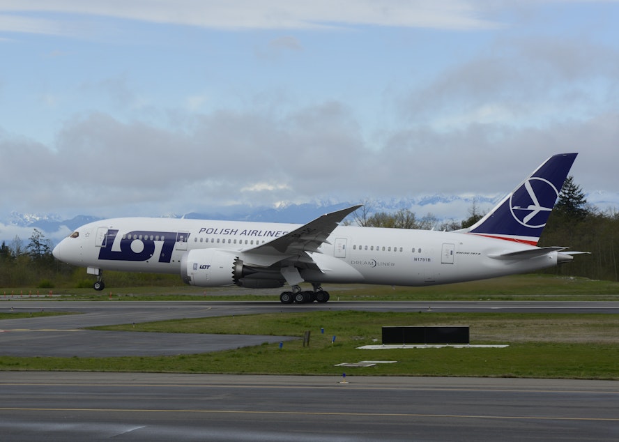 caption: A 787 destined for LOT Polish Airlines takes off from Boeing Field. 