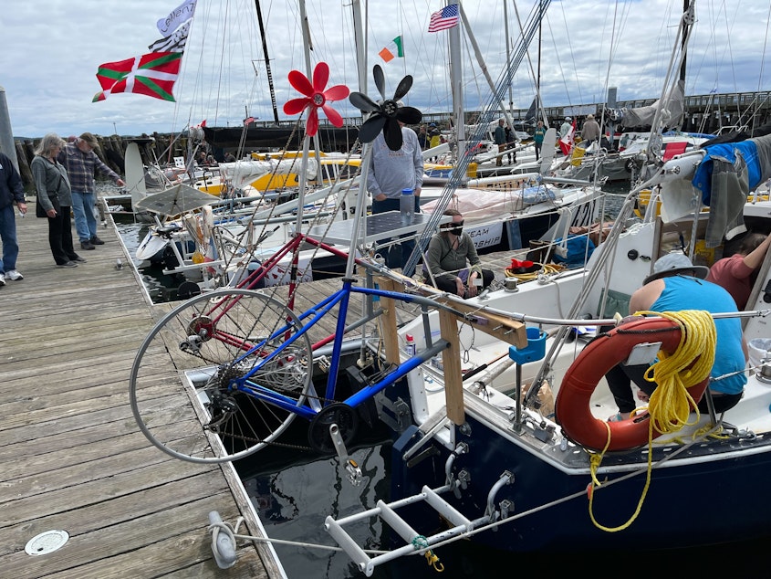 caption: Most Race to Alaska vessels sport a jury-rigged pedal drive or oarlocks in unusual places to provide propulsion in place of banned outboard motors.