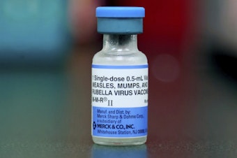 caption: This Friday, May 17, 2019 file photo shows a vial of a measles, mumps and rubella vaccine in Mount Vernon, Ohio. 