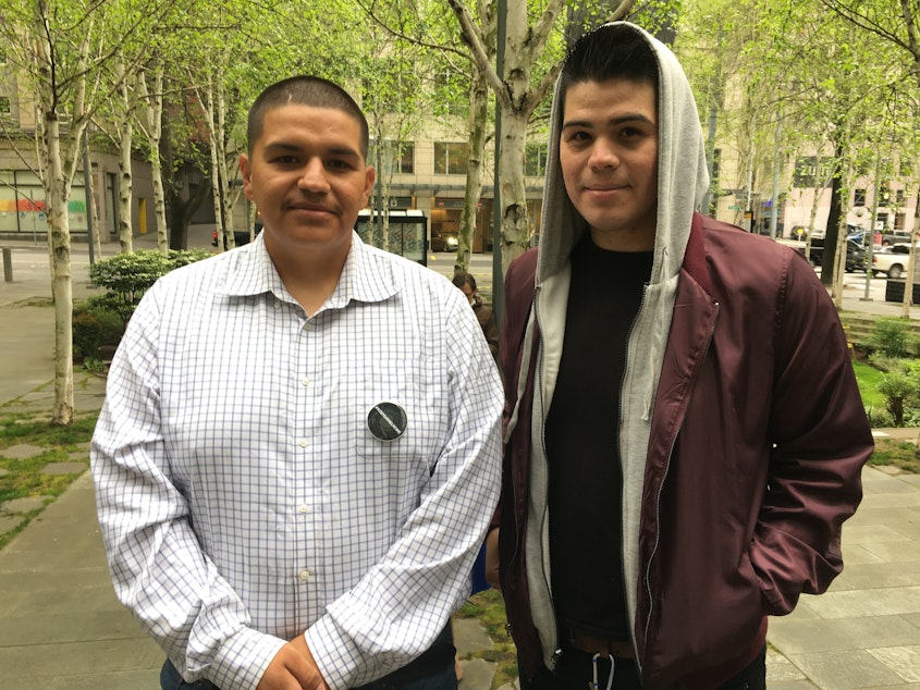 caption: Daniel Ramirez Medina, left, and his brother Tony Ramirez Medina outside of U.S. District Court in Seattle on May 1, 2018.