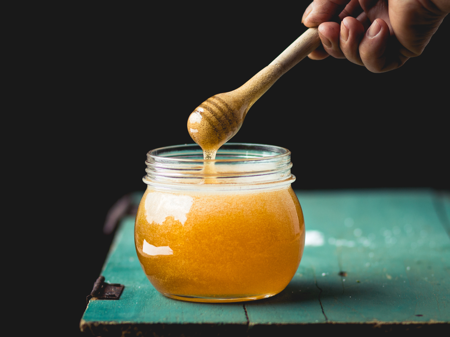 caption: A spoonful of honey makes the medicine...irrelevant. That's because honey works better than cough syrups to help with kids' coughs. But don't give honey to infants under one years old.
