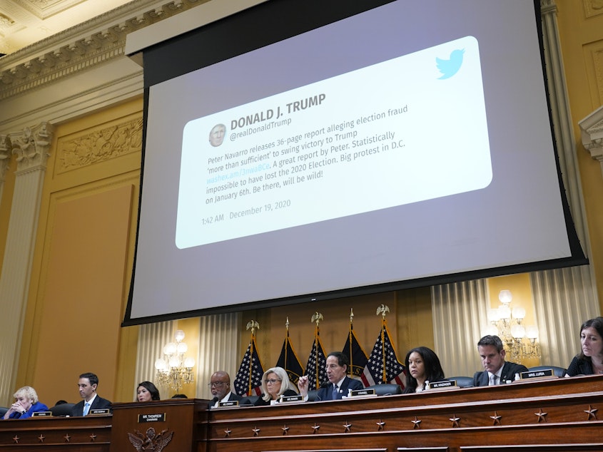 caption: A tweet from former President Donald Trump is shown as the House select committee investigating the Jan. 6 attack on the U.S. Capitol holds a hearing on Tuesday.