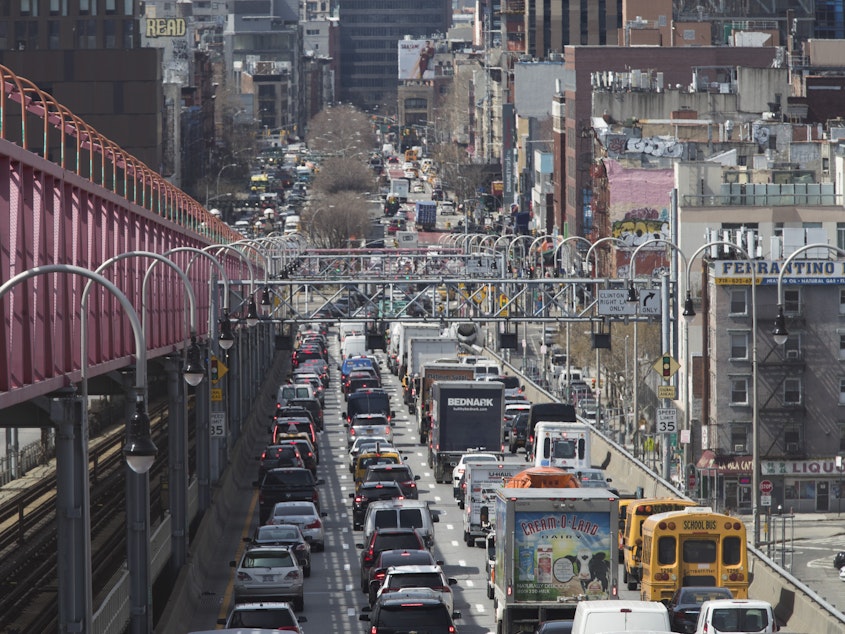 caption: Traffic makes its way into Manhattan over the Williamsburg Bridge in March 2019. New checkpoints at New York City's major bridges, tunnels and other sites are meant to drive home the message that 14-day quarantine rules are mandatory for people returning from states considered coronavirus hot spots.