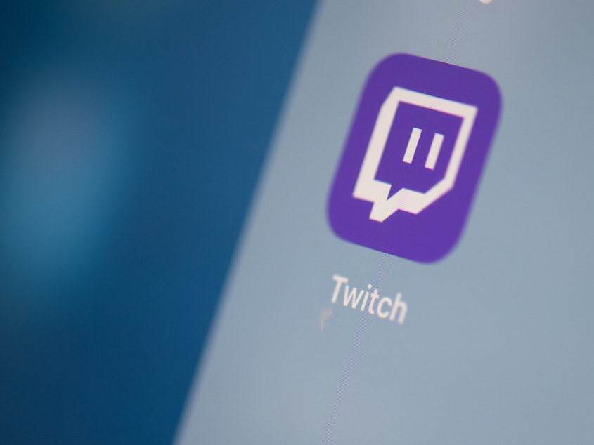 caption: A Twitch logo is seen on the screen of a tablet in this 2019 photo.
