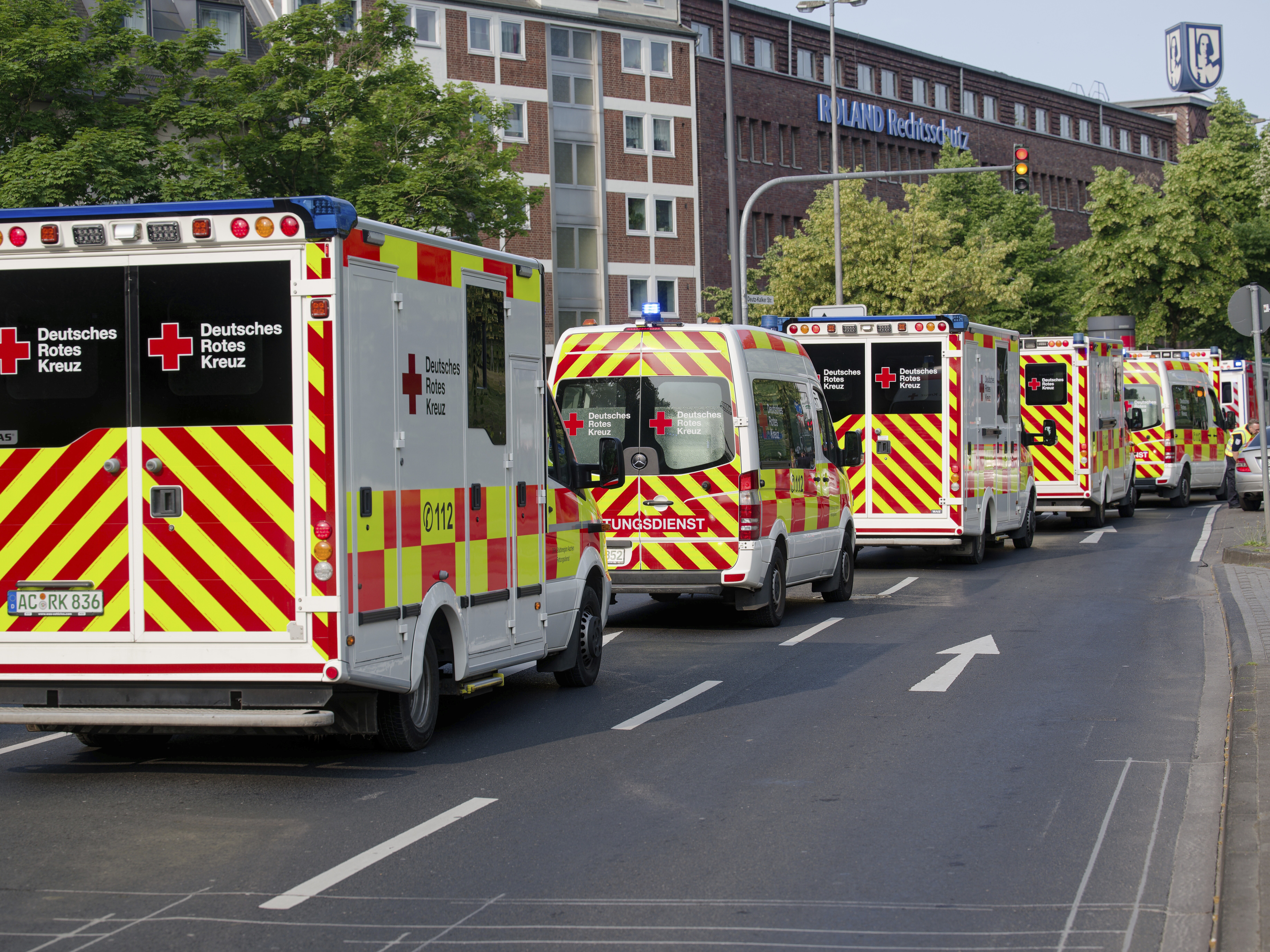 caption: Ambulances drive to the Eduardus Hospital in Cologne-Deutz to evacuate the hospital before specialists defuse three unexploded U.S. bombs from World War II that were unearthed earlier this week in Cologne, Wednesday, June 4, 2025.
