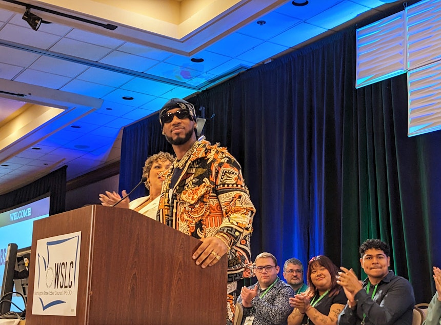 caption: Amazon Labor Union President Chris Smalls speaks at the Washington State Labor Council Convention.