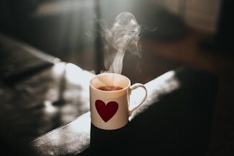 caption: One neuroscientist finds that simply savoring a cup of tea as a daily morning ritual has helped her quell anxious thoughts in pandemic times. "It felt like I finally had a great excuse to just be present and enjoy the breeze and warmth of the bowl of tea and the reflections that I could see on the surface," she says.