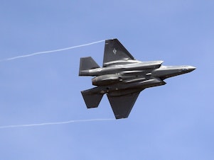 caption: An F-35 jet arrives at its new operational base at Hill Air Force Base, in northern Utah, in 2015. The aircraft have been temporarily grounded for inspections after one crashed in South Carolina last month.