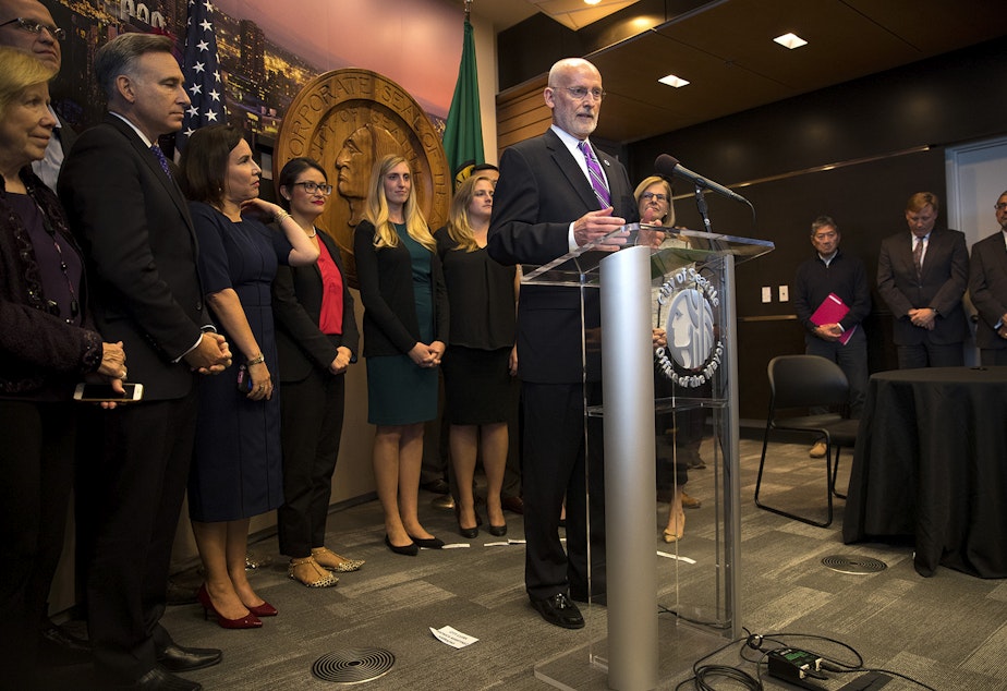 caption: Mayor Tim Burgess answers questions on Monday, September 18, 2017, after taking the oath of office and becoming the mayor of Seattle, at City Hall in Seattle.