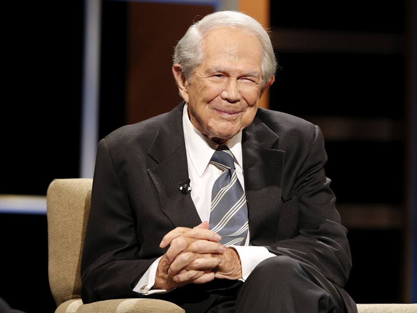 caption: Pat Robertson speaks during a forum at Regent University in Virginia Beach, Va., in 2015. Robertson was a religious broadcaster who turned a tiny Virginia station into the global Christian Broadcasting Network, tried a run for president and helped make religion central to Republican Party politics in America through his Christian Coalition.