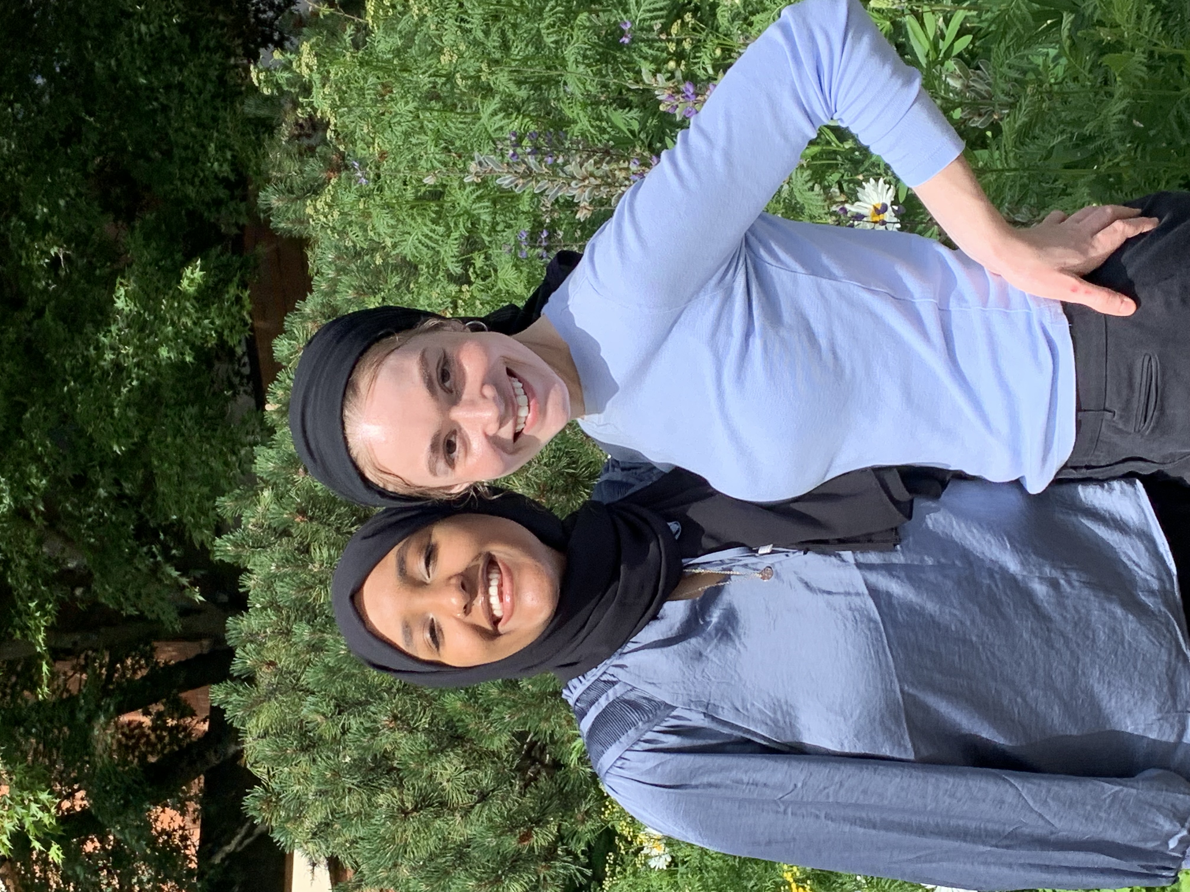 caption: Najuma Abadir (left) and Johannah Twa on June 17, 2022.