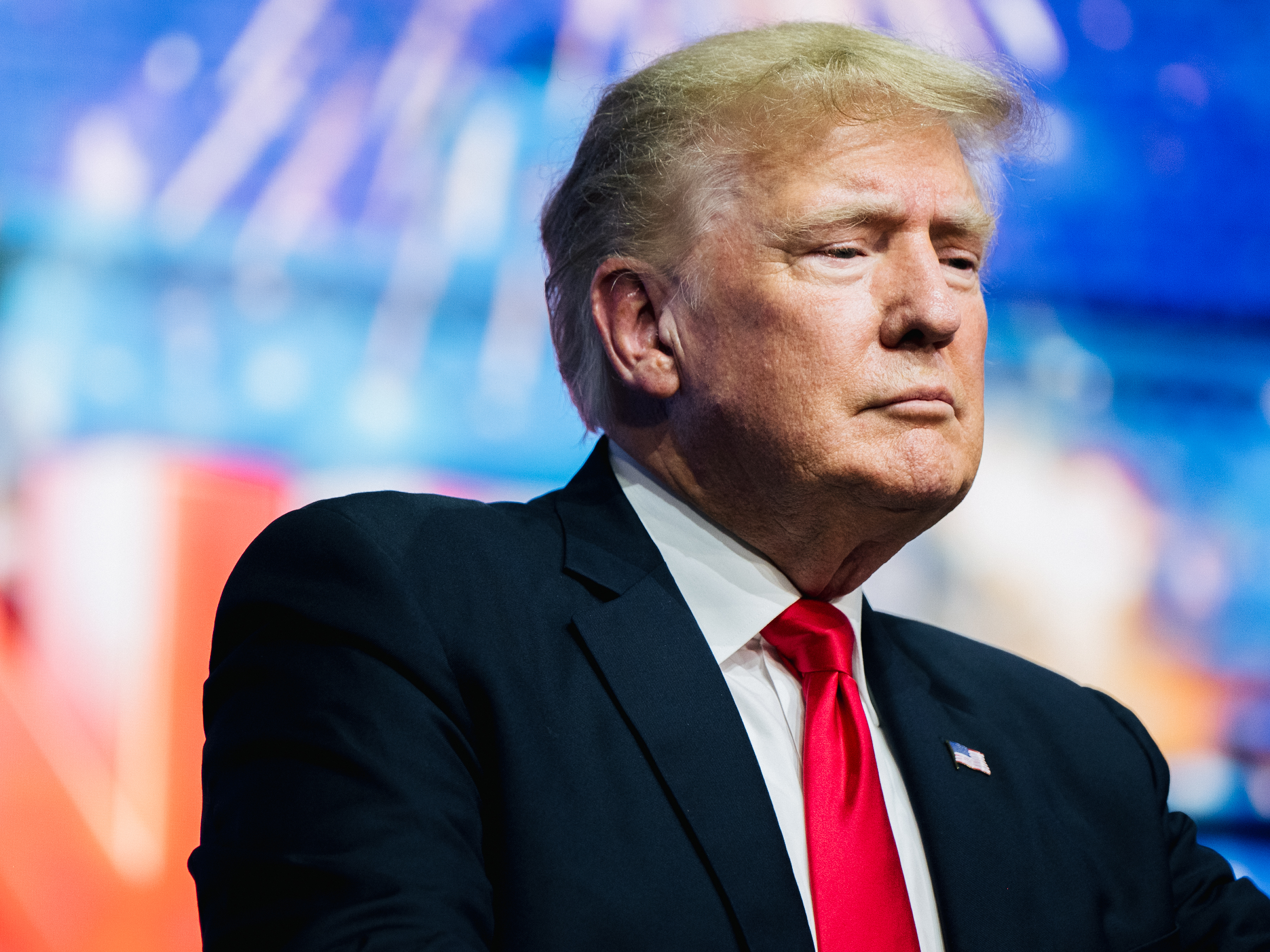 caption: A planned merger between former President Donald Trump's social media startup and a so-called special purpose acquisition company, or a shell company, is being investigated by regulators.