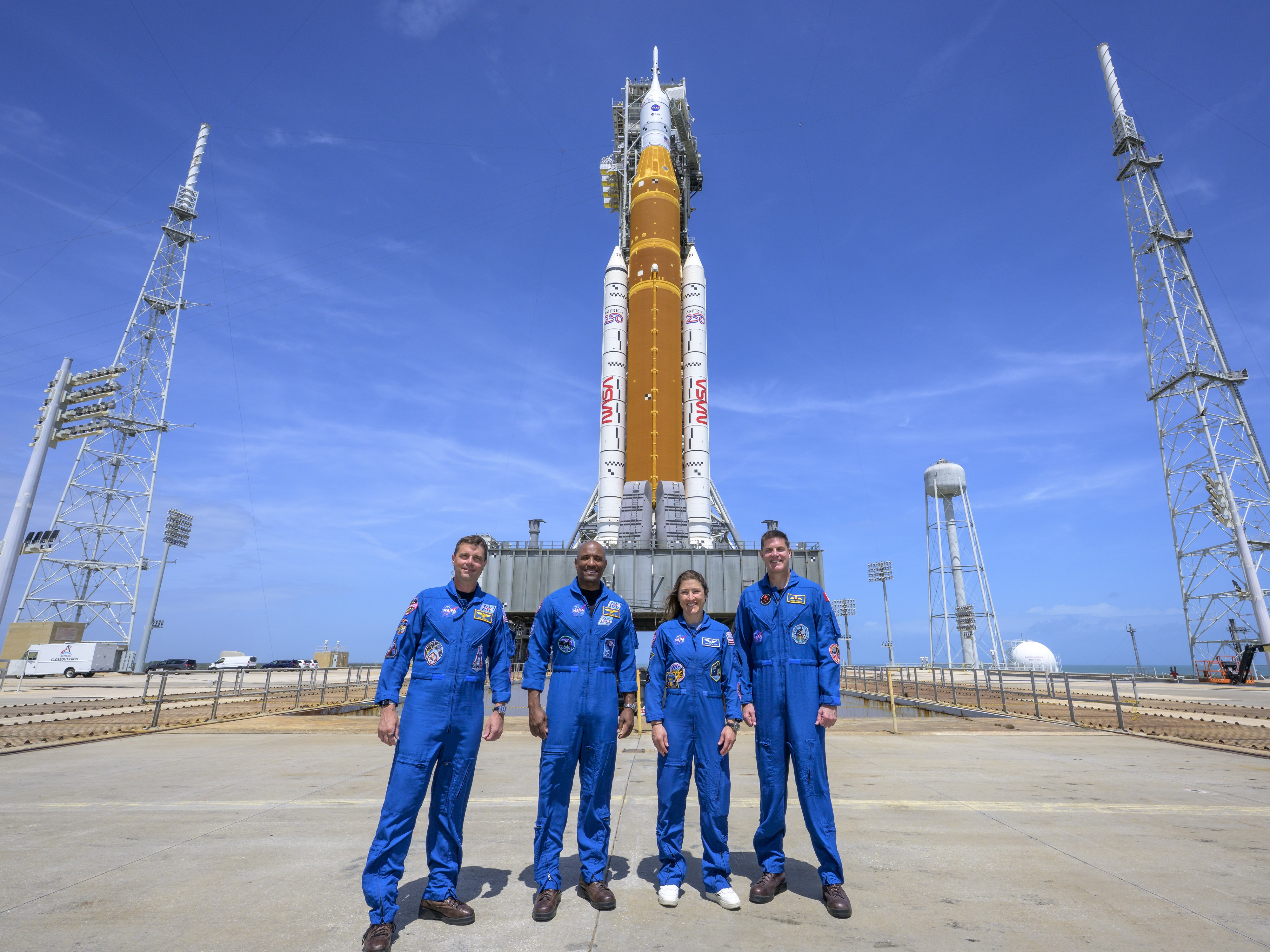 caption: The Artemis II crew includes three NASA astronauts — Reid Wiseman (left), Victor Glover, and Christina Koch, and the Canadian Space Agency's Jeremy Hansen. The four crew members are slated to launch as early as Wednesday, April 1 at 6:24 p.m. Eastern. If successful, it would mark the first time humans have visited the moon in more than 50 years.