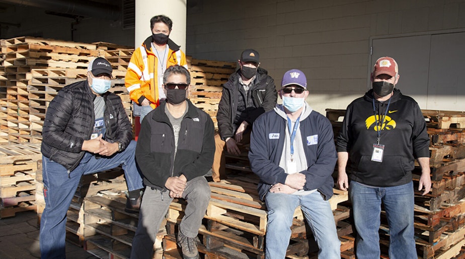 caption: Warehouse workers at Seattle Public Schools.