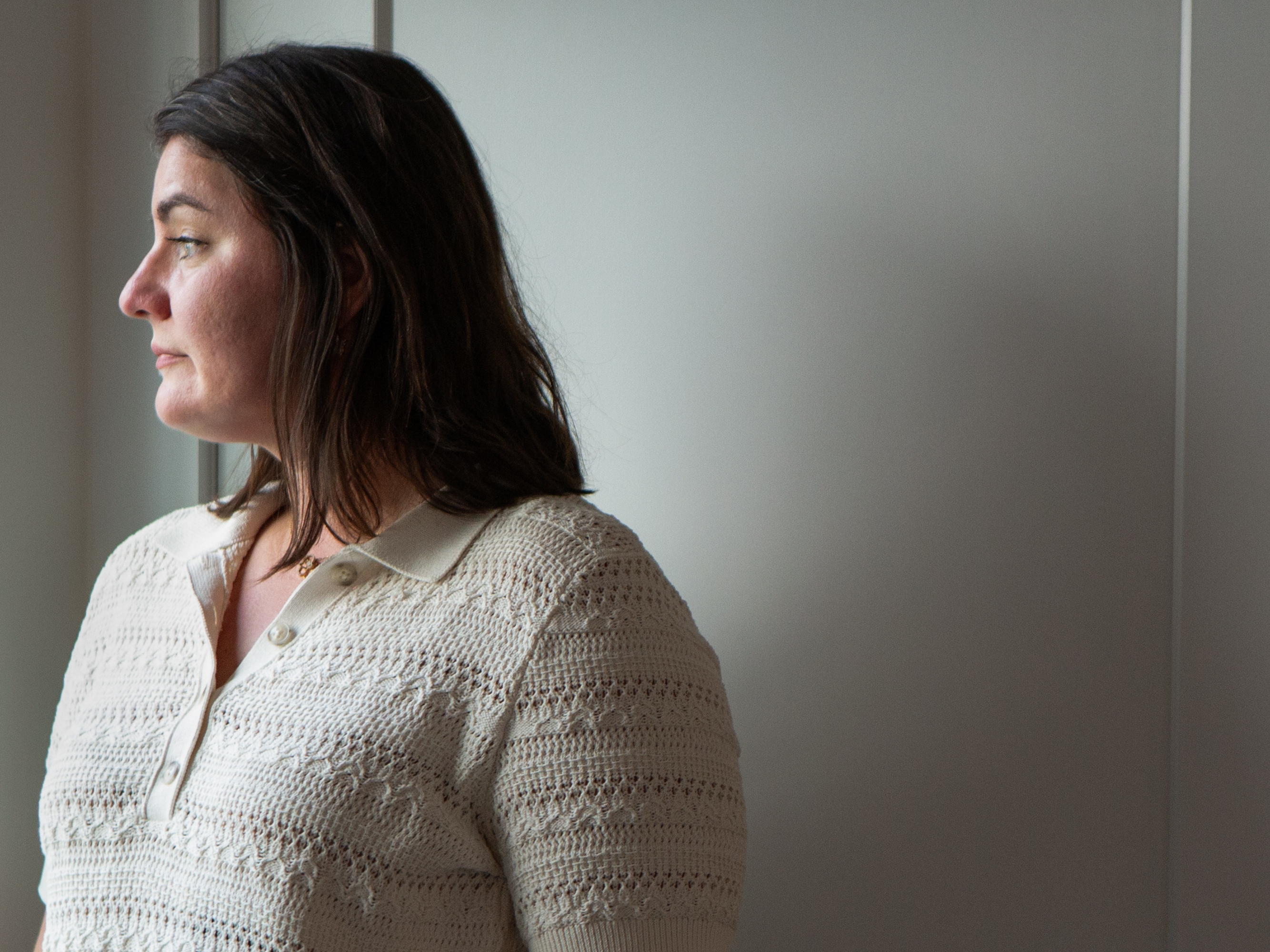 caption: Karina Ambartsoumian-Clough at home in New Jersey on July 26. She was born in what was then Soviet Ukraine and fled to the U.S. with her family in 1996. They sought — and were denied — political asylum and discovered they were not recognized as citizens of any country.