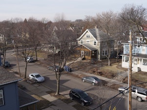 caption: A view of the Kingfield neighborhood from the roof of the Sundial Building, a new 12-unit apartment building in Minneapolis.