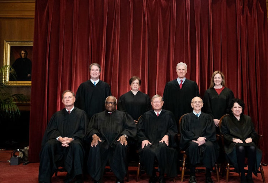 caption: The justices of the U.S. Supreme Court who decided this term's cases.
