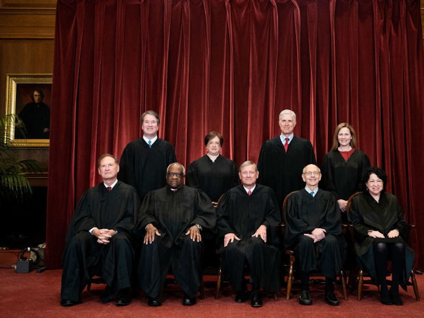 caption: The justices of the U.S. Supreme Court who decided this term's cases.