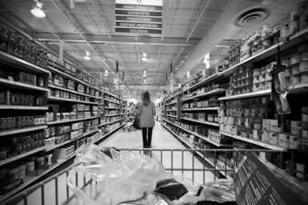 caption: Shopping in a grocery store