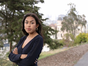 caption: Tashrima Hossain, who used to work in Wall Street but quit to join Facebook, is part of a growing number of young people who are no longer attracted by the allure of Wall Street despite the rising salaries. She poses for a portrait at Alamo Square in San Francisco, Calif. on Wednesday, August 11, 2021.