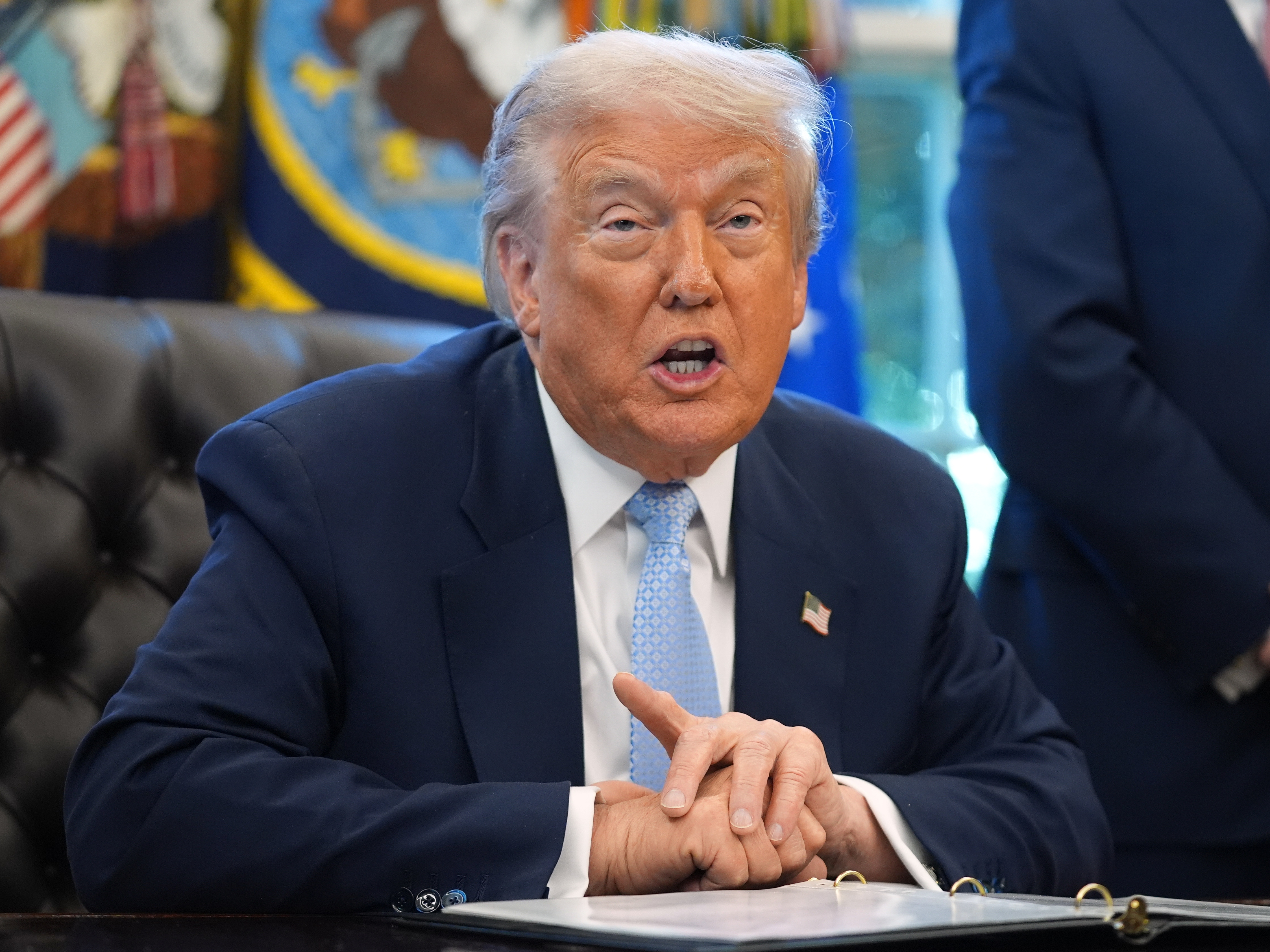 caption: President Donald Trump speaks during a meeting with the White House task force on the 2026 FIFA World Cup in the Oval Office of the White House, Monday, Nov. 17, 2025, in Washington.