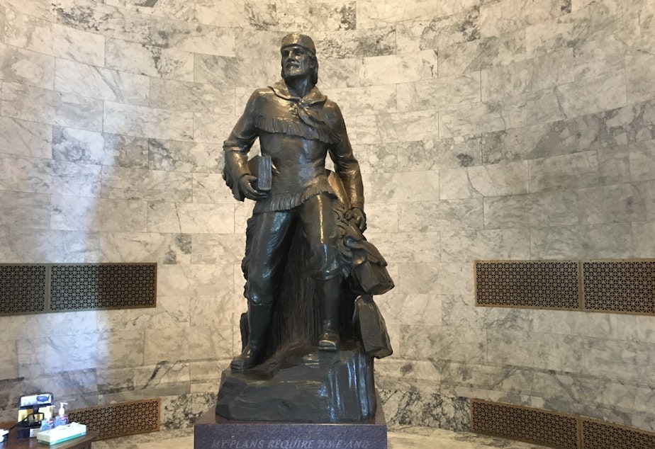 caption: A state senator from Seattle wants to replace this statue of Marcus Whitman inside the entrance to the Washington State Capitol -- as well as an identical one in the U.S. Capitol -- with another figure from history.