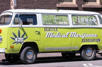 caption: Seattle Medical Marijuana van, usually parked outside a dispensary on Fremont Avenue near the Woodland Park Zoo. Tensions have mounted between medical marijuana entities and state-licensed pot shops.