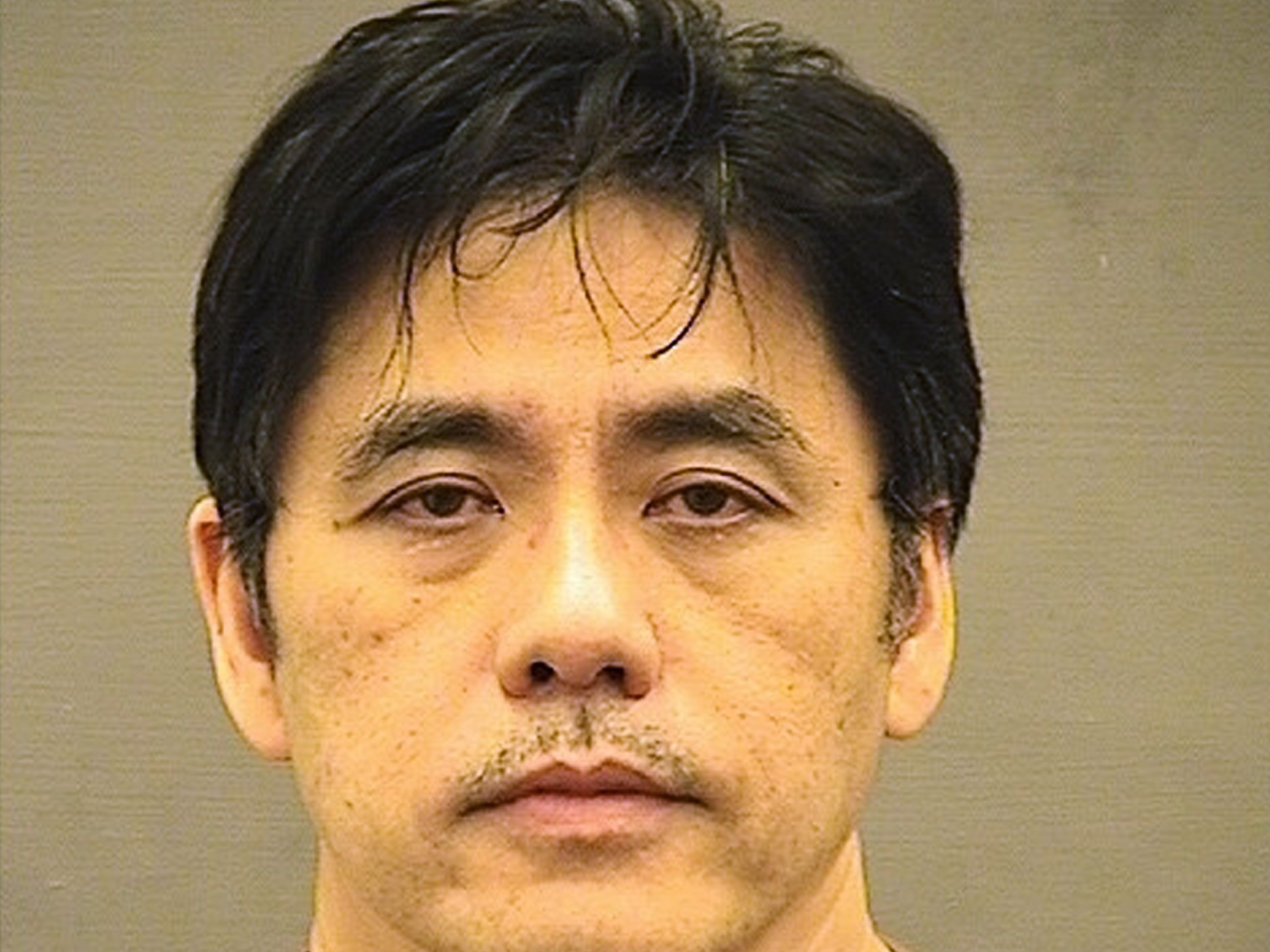 caption: Former CIA officer Jerry Chun Shing Lee, 54, in an undated photo provided by the Sheriff's Office in Alexandria, Va.