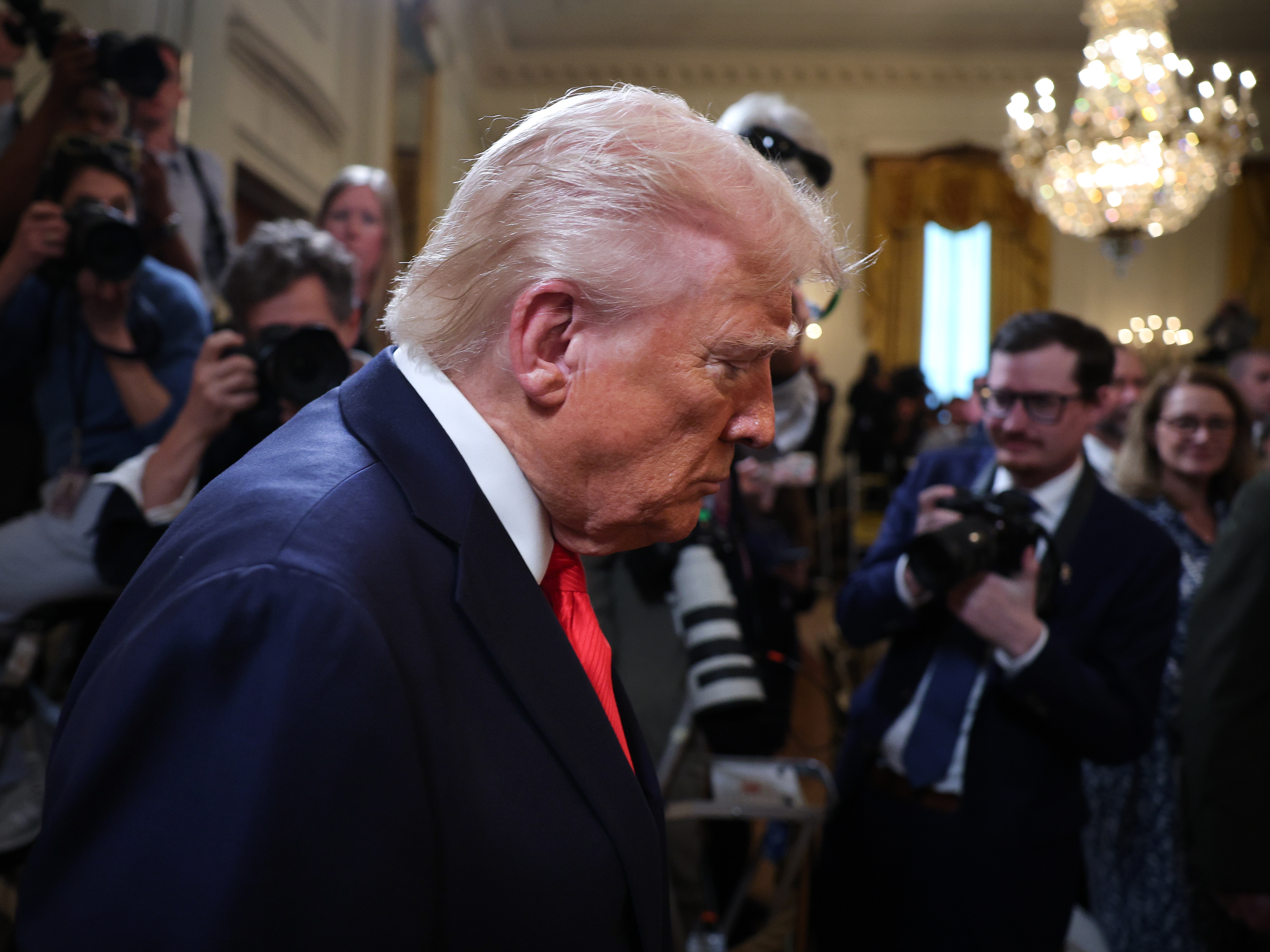 caption: President Trump arrives for a presentation ceremony for the Commander-in-Chief Trophy to the U.S. Naval Academy Midshipmen at the White House on April 15.