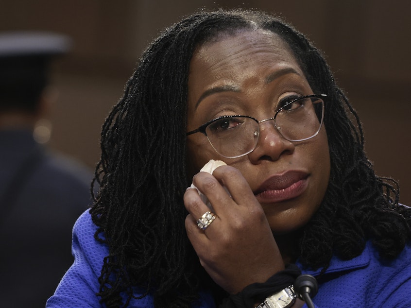 caption: Supreme Court nominee Judge Ketanji Brown Jackson wipes away tears during her confirmation as Sen. Cory Booker quotes Langston Hughes in support of her.