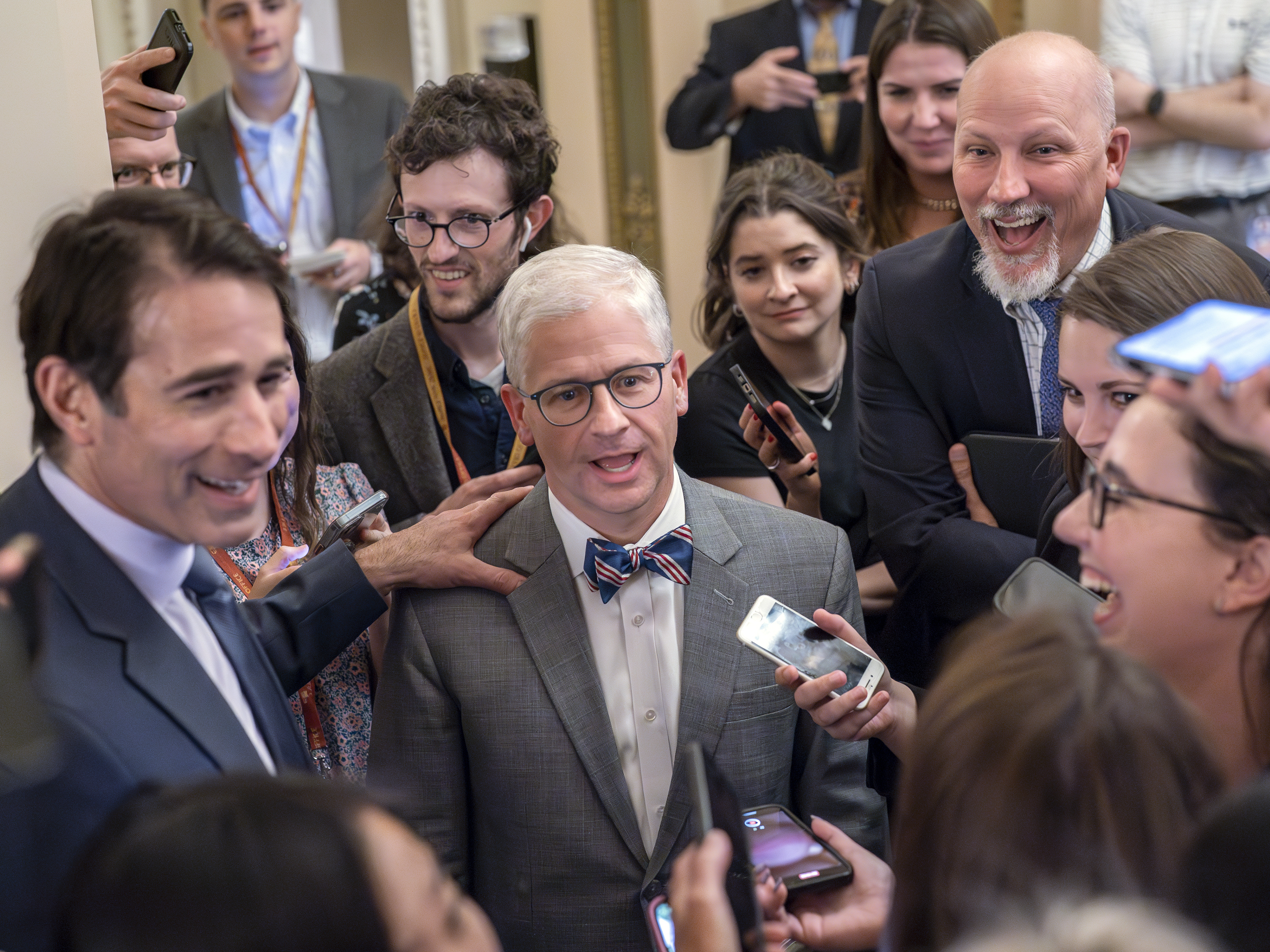 caption: Top Republican debt crisis mediators Rep. Garret Graves, R-La. (left), and Rep. Patrick McHenry, R-N.C. (center), update reporters on the talks with the Biden administration at the Capitol on Tuesday.